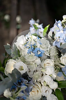 Bridal bouquet. Wedding. Beautiful bouquet of white, blue flowers and greenery. Fresh flowers bouquet.