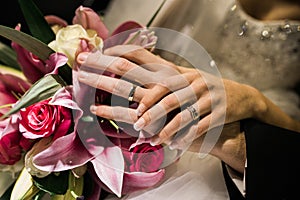 Bridal couple withwedding rings