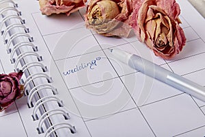 Bridal Dreams - Capturing the Essence of Wedding Preparations - calendar, rings and flowers, wedding checklist