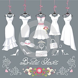 Bridal dresses hang on ribbons. Fashion accessories