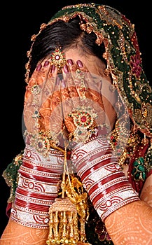 Bridal hands on face