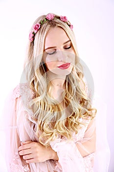 Bridal makeup concept. Gorgeous young woman with long blonde hair