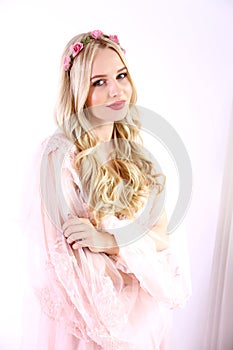 Bridal makeup concept. Gorgeous young woman with long blonde hair