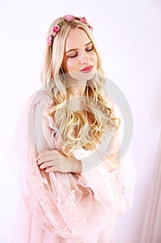 Bridal makeup concept. Gorgeous young woman with long blonde hair