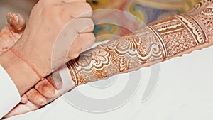 Bridal mehndi full hand bridal mehndi design on beautiful Indian woman hands being designed Indian Wedding