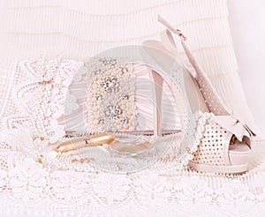 bridal shoes, bag and beads photo
