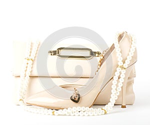 Bridal shoes, bag and beads photo