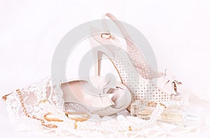 Bridal shoes, lace and beads photo