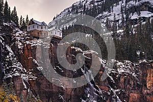 Bridal Veil Falls with a power plant at its top in Telluride, Colorado