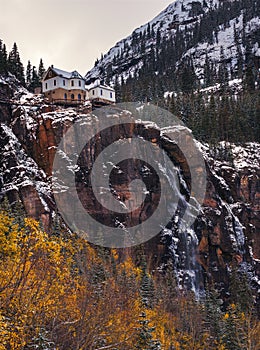 Bridal Veil Falls with a power plant at its top in Telluride, Colorado