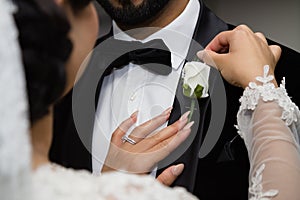Bride Adjusting Buttonhole