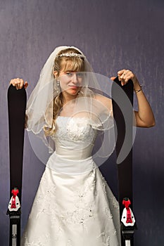 Bride with alpine skis