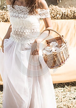 The bride with a basket in hands