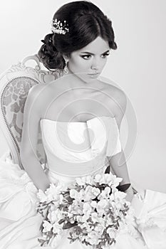 Bride. Beautiful girl wearing in modern wedding dress. Fashion m