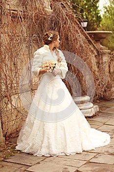 Bride beautiful woman in wedding dress - outdoor portrait