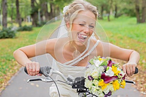 Bride on a bicycle being flirty