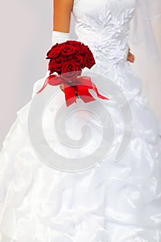 Bride with a bouquet in a hand