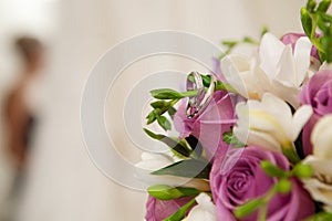 Bride, bouquet with rings and wedding dress