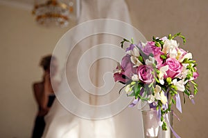 Bride, bouquet and wedding dress