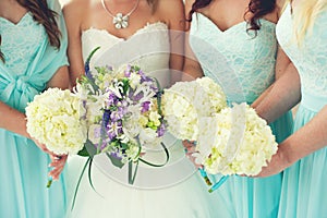 Bride and Bridesmaids bouquets photo