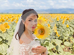 Bride in Bulgarian sunflower field