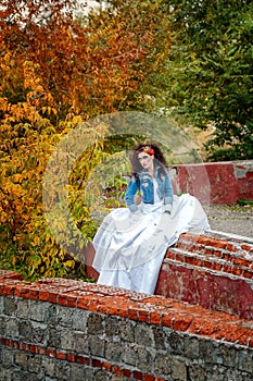 Bride in city park