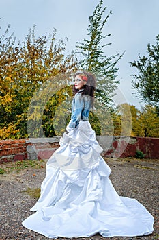 Bride in city park