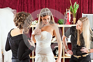 Bride at the clothes shop for wedding dresses