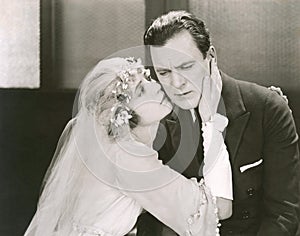 The bride comforts the groom