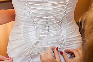 Bride corset tightened