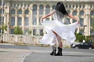 Bride dancing on the street