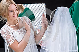 Bride with doubts before wedding photo