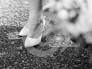 Bride elegant shoes on the ground