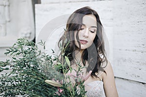 Bride fashion with romantic flower bouquet in Rome