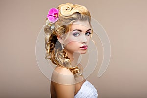 Charm. Portrait of Elegant Blond hair Woman Fiancee with Flowers. Womanliness