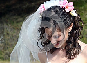 Bride with Frangipanis in Hair