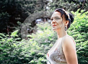 Bride, girl in white dress in the park