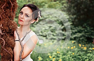 Bride, girl in white dress in the park