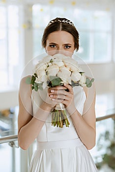 bride on the gold hotel stairs