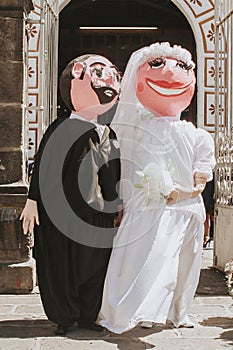 Bride and groom big puppet, mexican wedding in Oaxaca Mexico, mono de Calenda for wedding Giant dancer with costume