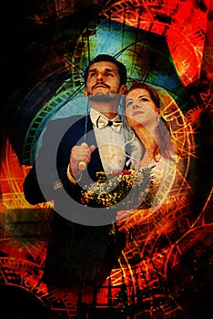 The bride and groom with blue umbrella and zodiac collage.
