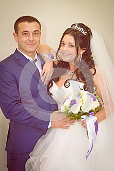 Bride and groom with a bouquet