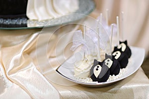 Bride and groom cake pops