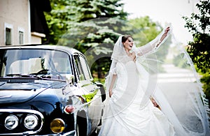 Bride and groom in car