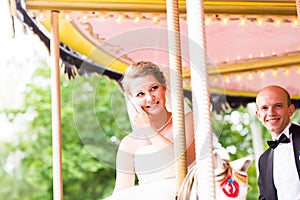 Bride and groom in a carriage