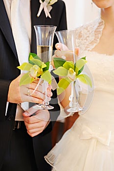 Bride and groom and champagne glasses