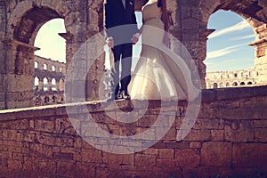 Bride and groom at Colosseum, Rome