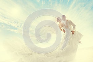 Bride and Groom Couple Dancing, Wedding Dress and Long Veil