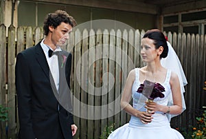 Bride and groom in courtyard