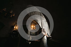 The bride and groom in a cozy house, photo taken with natural li